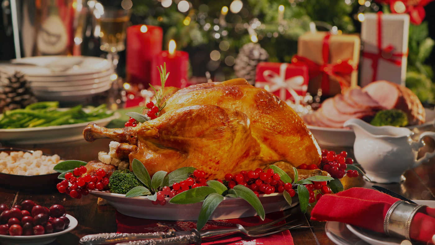 Lisa's Corner - Holiday Heart Hunger - Header Image festive holiday table setting featuring turkey and cranberries and Christmas decorations