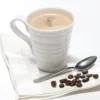 SkinnyBox - Classic Cappuccino New - SBBXHD2 - Product Image picture of a cup of creamy cappuccino with spoon and coffee beans lying beside it